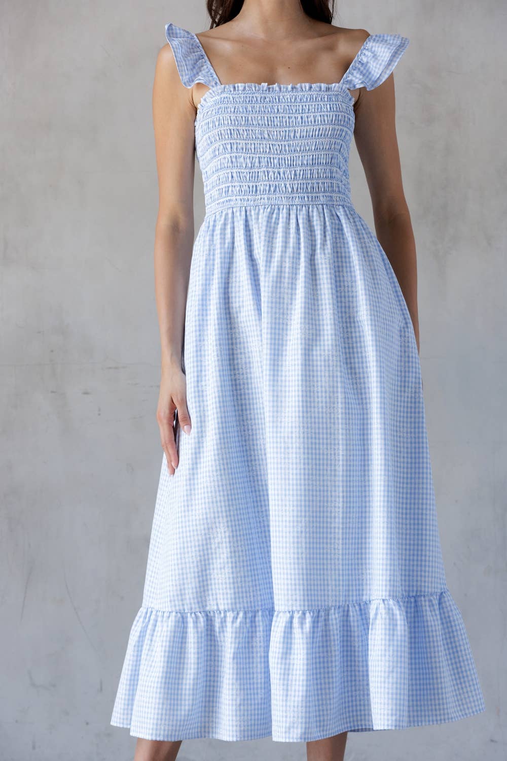 A BLUE GINGHAM SMOCKED BODICE MIDI DRESS