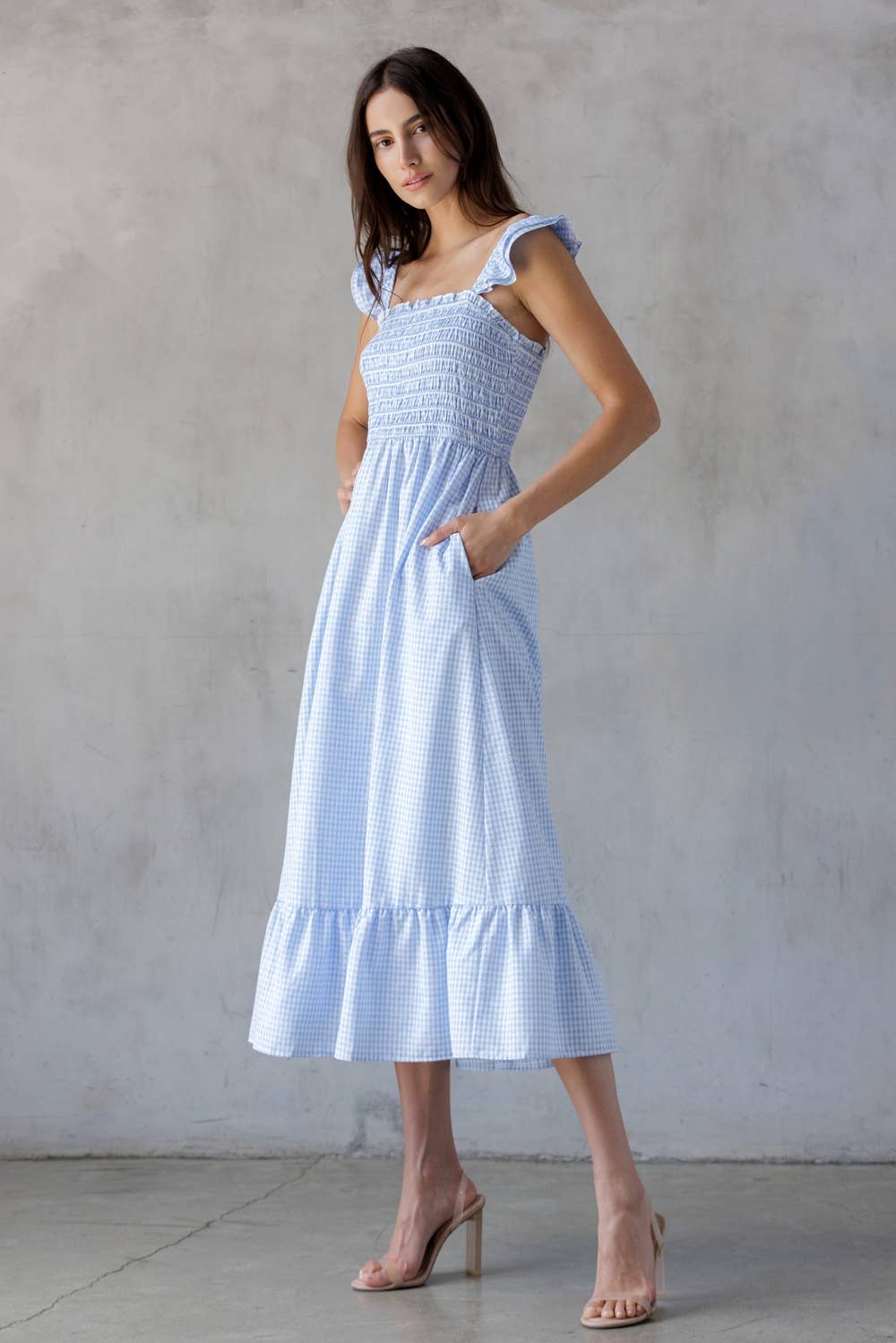 A BLUE GINGHAM SMOCKED BODICE MIDI DRESS